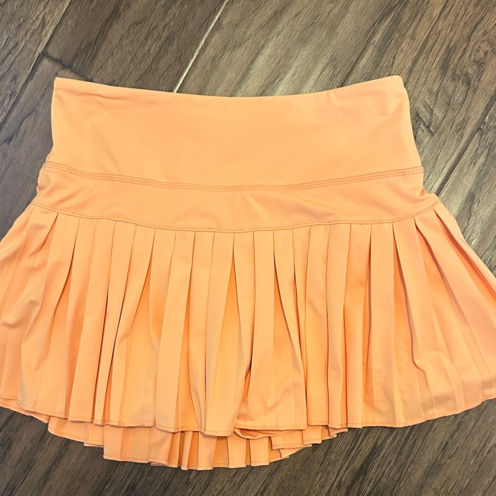 Gold hinge orange skort size small